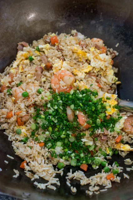 shrimp and bacon fried rice in wok
