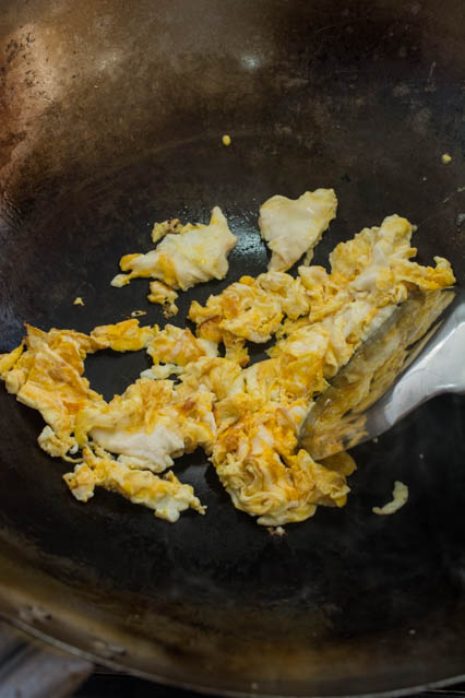 scrambled eggs in a wok