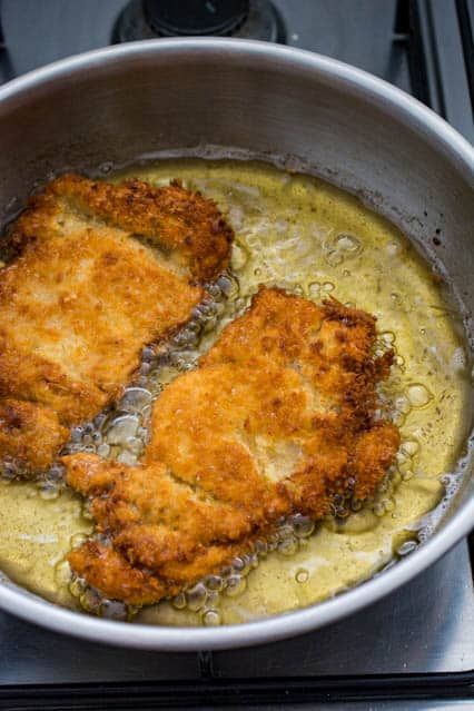 chicken katsu in frying pan