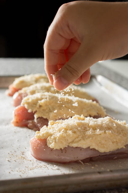 Parmesan Crusted Chicken is guaranteed to turn out super-moist and juicy every single time. Takes just minutes to prepare which makes it perfect for a family weeknight meal yet it is elegant enough for your next romantic evening in. 