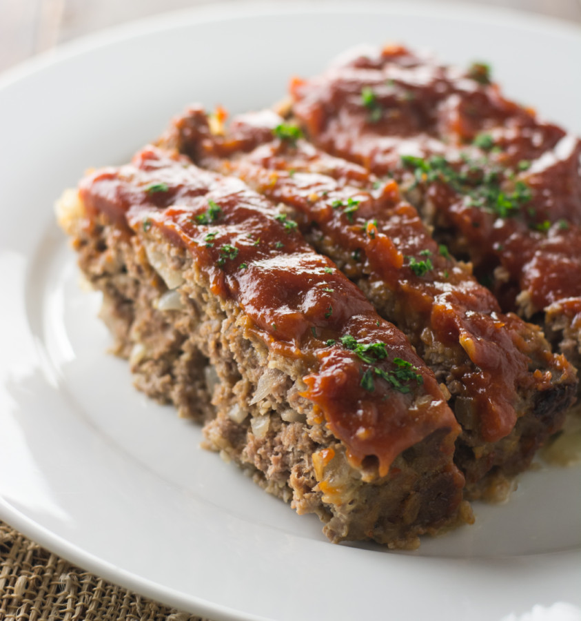 data-pin-description="A super simple and absolutely delicious meatloaf recipe. The sauce has one "secret" ingredient that makes it over-the-top...and your kitchen will smell AMAZING!"