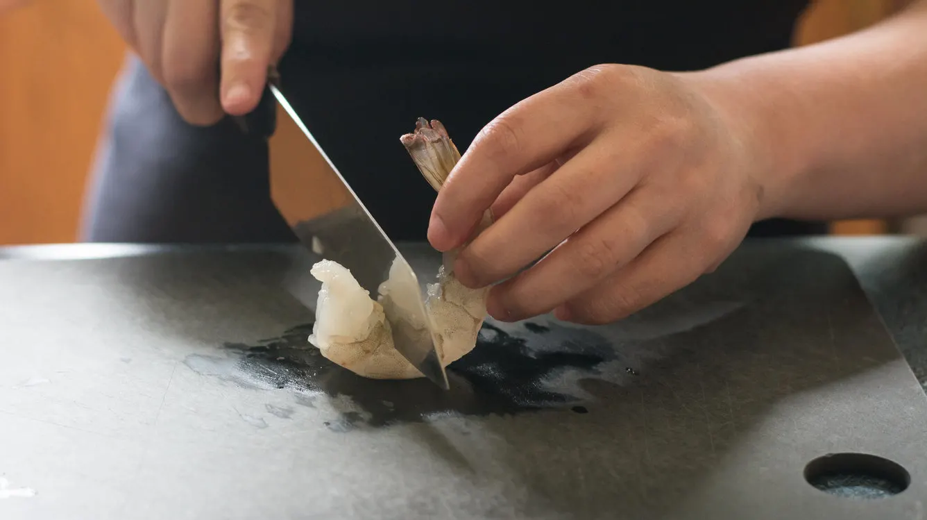 cutting shrimp for Shrimp Tempura