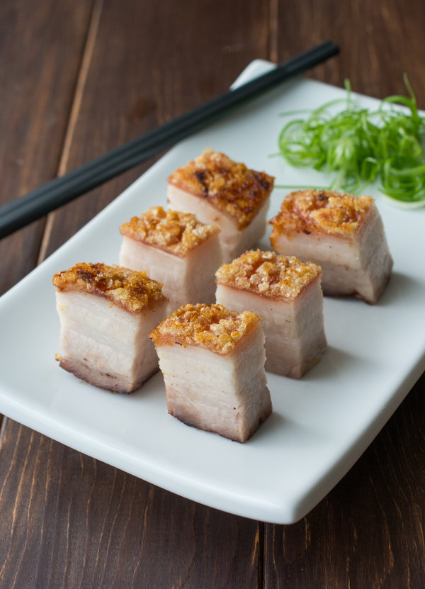 Crispy Roasted Pork Belly - extra crispy skin over super tender, flavorful meat. Best of all, really simple to make! Click on my page for a step-by-step walk-through!