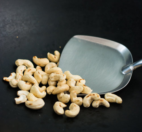 Roasting cashews for Nyonya Sambal Goreng