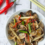 Asian Stir-Fried Clams is a simple but flavorful dish. The combination of these common Chinese-cooking ingredients really elevate the flavor of this wonderful shellfish.