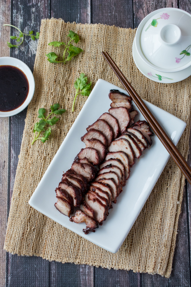 This Chinese BBQ Pork (Char Siu) recipe features a sweet, thick marinade that doubles as a dipping sauce. Now you can make this Chinatown favorite in your own kitchen! You won't believe how easy this recipe is!