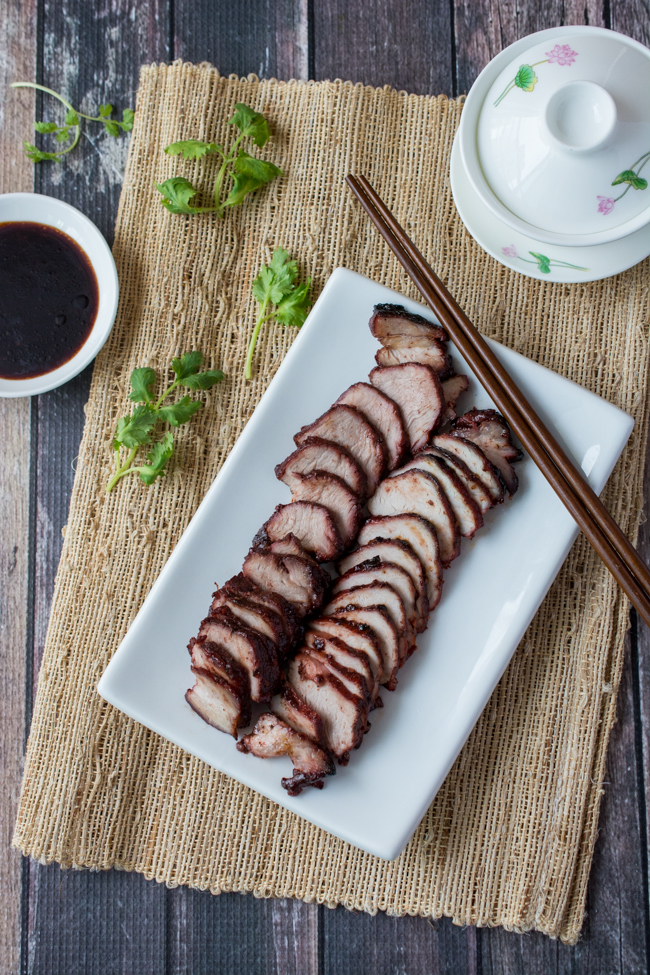 This Chinese BBQ Pork (Char Siu) recipe features a sweet, thick marinade that doubles as a dipping sauce. Now you can make this Chinatown favorite in your own kitchen! You won't believe how easy this recipe is! 