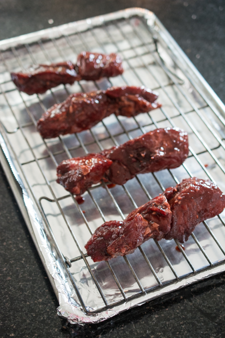 This Chinese BBQ Pork (Char Siu) recipe features a sweet, thick marinade that doubles as a dipping sauce. Now you can make this Chinatown favorite in your own kitchen! You won't believe how easy this recipe is! 