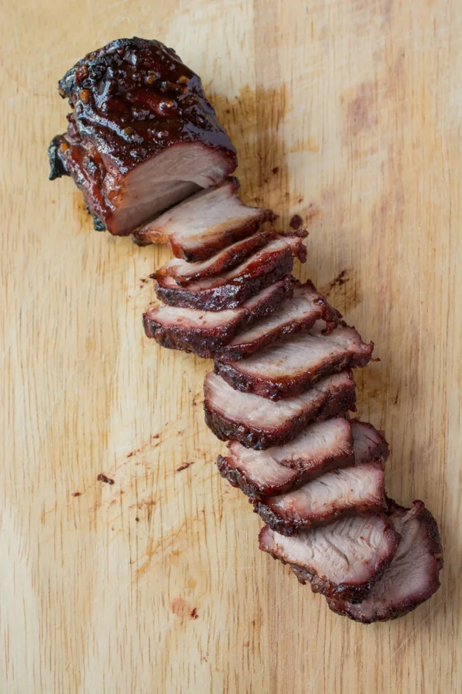 This Chinese BBQ Pork (Char Siu) recipe features a sweet, thick marinade that doubles as a dipping sauce. Now you can make this Chinatown favorite in your own kitchen! You won't believe how easy this recipe is! 