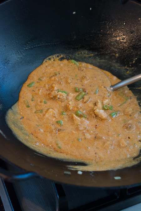 Thai Red Curry Baked Potatoes is an "East Meets West" version of comfort food. Perfect fluffy baked potato topped with a creamy, rich Thai Red Curry with tender chicken and crunchy green beans. 