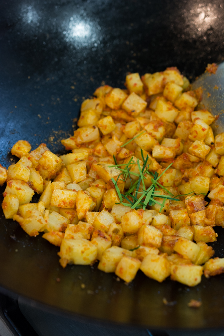 Spicy Fried Potatoes (Indonesian Sambal Goreng Kentang) is the Indonesian version of home fries. It's spicy, sweet and tangy. Serve as a side dish, or enjoy over steamed rice. 