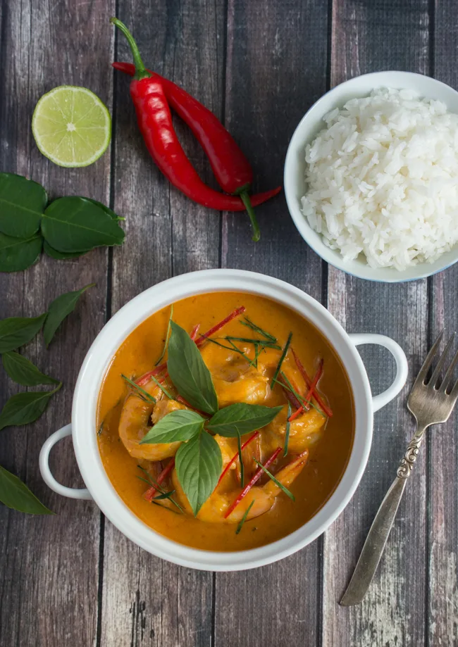 Creamy, silky and incredibly tasty Thai Red Curry Shrimp will be your new go-to dish. It takes just minutes to put together and tastes even better than takeout!