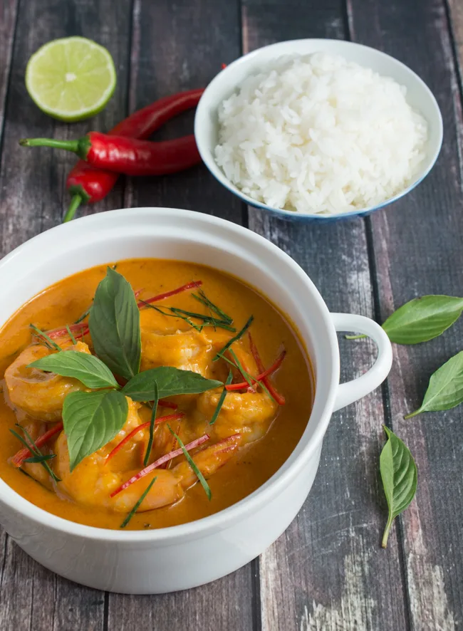 Creamy, silky and incredibly tasty Thai Red Curry Shrimp will be your new go-to dish. It takes just minutes to put together and tastes even better than takeout!