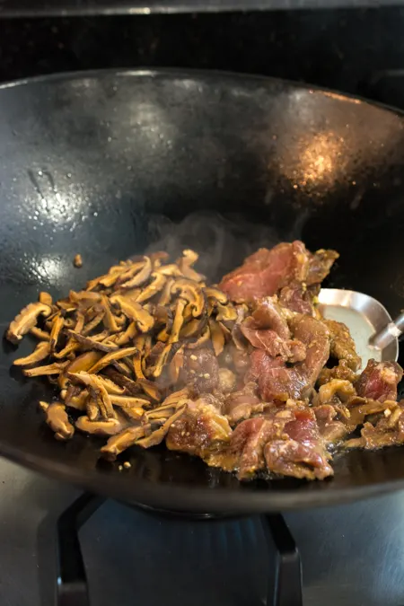 Japchae is a classic Korean noodle dish that can be served as a side dish, main dish, or over rice. Stir-fried glass noodles with sliced beef, julienned carrots, vegetables and mushrooms, tossed in a sweet soy sauce dressing.