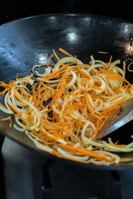 Japchae is a classic Korean noodle dish that can be served as a side dish, main dish, or over rice. Stir-fried glass noodles with sliced beef, julienned carrots, vegetables and mushrooms, tossed in a sweet soy sauce dressing. 