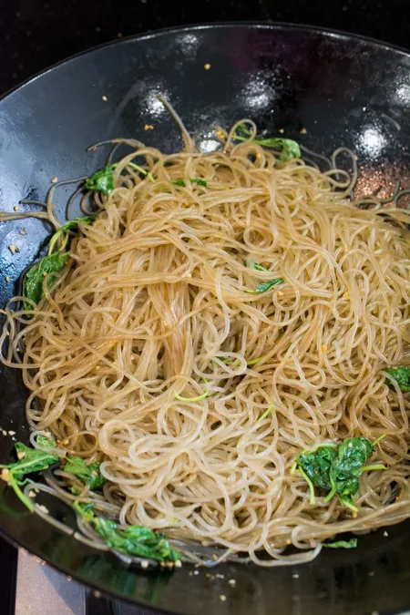 Japchae is a classic Korean noodle dish that can be served as a side dish, main dish, or over rice. Stir-fried glass noodles with sliced beef, julienned carrots, vegetables and mushrooms, tossed in a sweet soy sauce dressing.