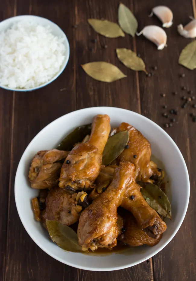 Chicken Adobo is a Filipino classic that has been dubbed the unofficial dish of the Phillippines. A simple blend of soy sauce, garlic, vinegar with bay leaves and whole peppercorns yileds one of the most incredible sauces you have ever tasted.