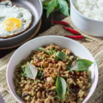 Thai Basil Chicken (Pad Krapow Gai or Gai Pad Krapow) is a classic Thai stir-fry where the amazing aroma of basil pairs so well with the savory sauce. Serve over steamed jasmine rice and top with a fried egg for the ultimate Thai comfort food; all ready in less than 20 minutes!