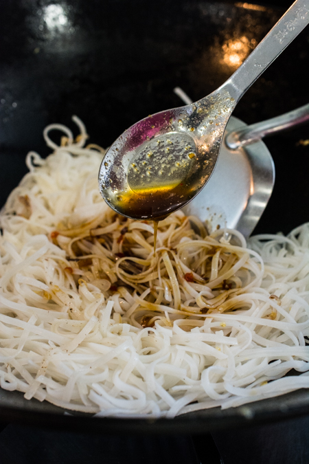 Authentic Pad Thai made easy! Rice noodles stir-fried in a slightly sweet and tangy sauce, topped with shrimp, sliced tofu, ground roasted peanuts, and fresh bean sprouts.