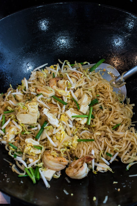 Authentic Pad Thai made easy! Rice noodles stir-fried in a slightly sweet and tangy sauce, topped with shrimp, sliced tofu, ground roasted peanuts, and fresh bean sprouts.