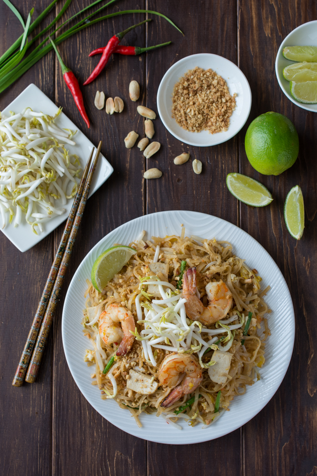 Authentic Pad Thai made easy! Rice noodles stir-fried in a slightly sweet and tangy sauce, topped with shrimp, sliced tofu, ground roasted peanuts, and fresh bean sprouts.