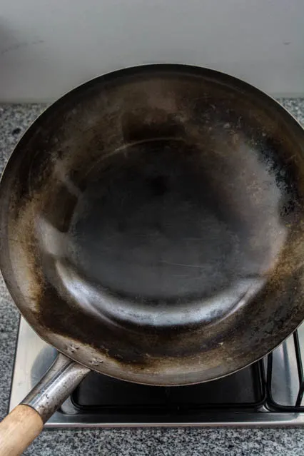 how to season a wok. seasoned wok after 9 months.