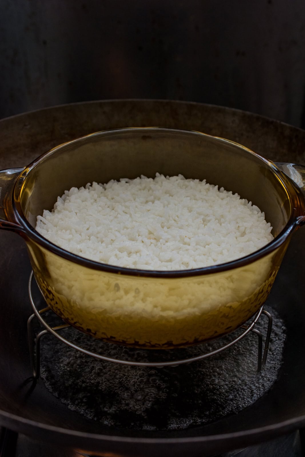 steamed rice in a wok