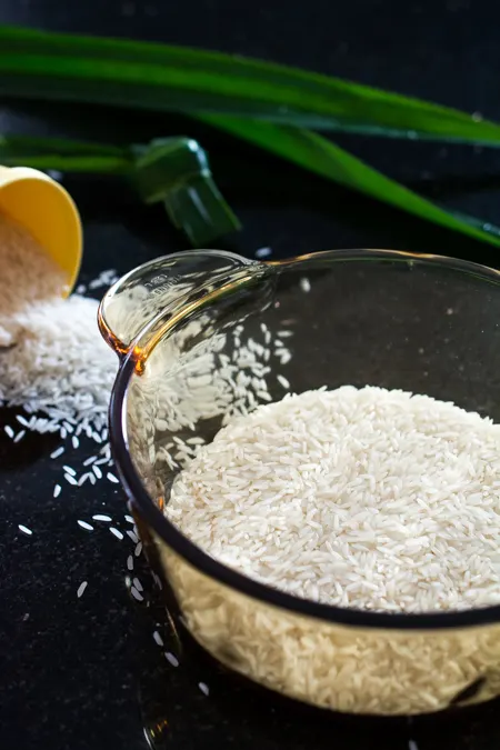 Uncooked white rice in a clear pot