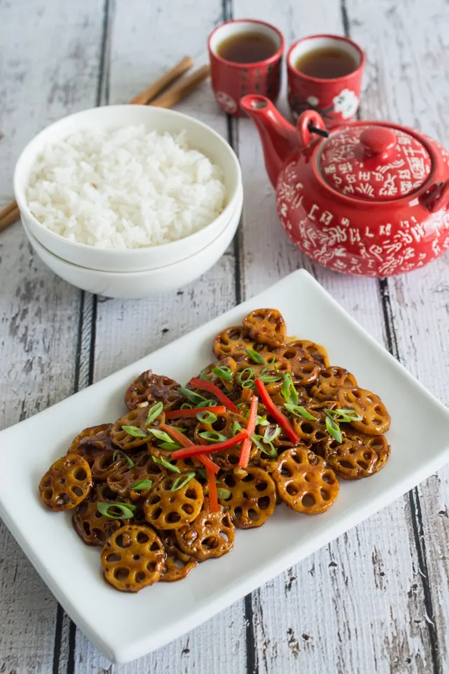 Stir Fried Lotus Root in Garlic Sauce features sliced crunchy lotus root tossed in a tangy garlic sauce. Healthy, nutritious, and incredibly delicious. Ready in only about 15 minutes!