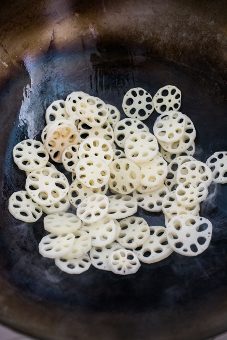 Stir Fried Lotus Root in Garlic Sauce features sliced crunchy lotus root tossed in a tangy garlic sauce. Healthy, nutritious, and incredibly delicious. Ready in only about 15 minutes!