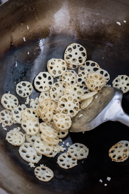 Stir Fried Lotus Root in Garlic Sauce features sliced crunchy lotus root tossed in a tangy garlic sauce. Healthy, nutritious, and incredibly delicious. Ready in only about 15 minutes!