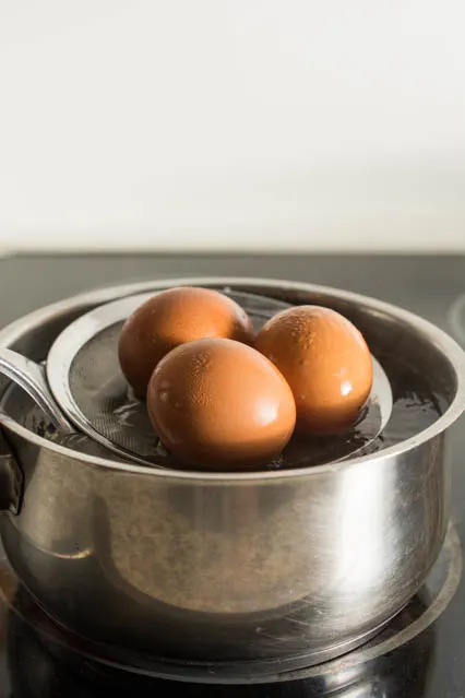 Half-Boiled Ajitama (Seasoned Ramen Eggs) have slightly firm egg whites and luscious custard-like yolks. The sweet soy seasoning gives them unbelievable flavor. Famously used as a topping for ramen but can be enjoyed as a snack anytime.