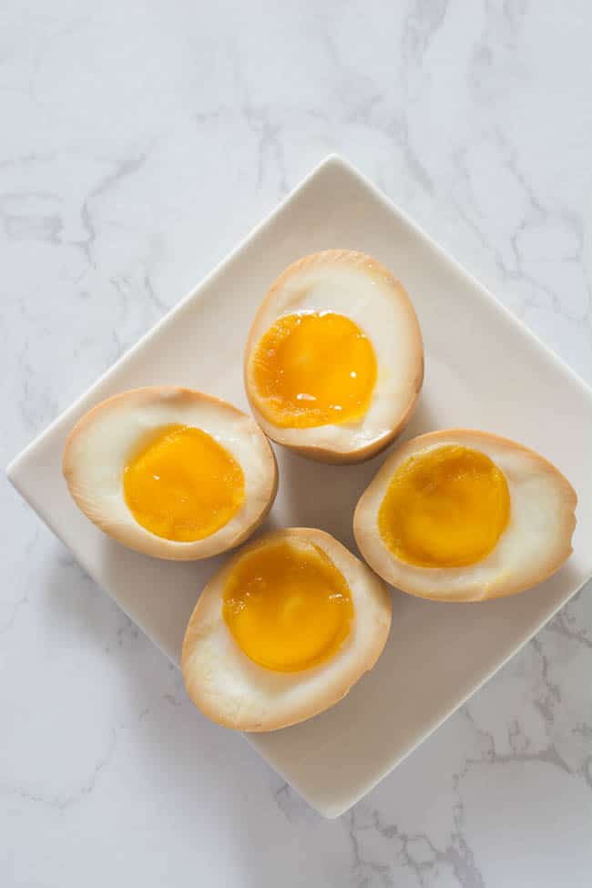 Half-Boiled Ajitama (Seasoned Ramen Eggs) have slightly firm egg whites and luscious custard-like yolks. The sweet soy seasoning gives them unbelievable flavor. Famously used as a topping for ramen but can be enjoyed as a snack anytime. 