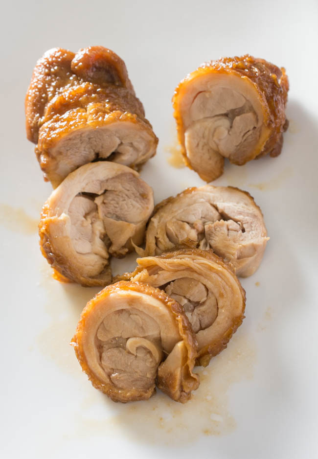 Chicken Chashu is a spin on the popular Pork Belly Chashu ramen topping. Rolled chicken thighs are pan-fried, braised in a sweet soy sauce, then left to marinade to soak in the delicious seasoning. 
