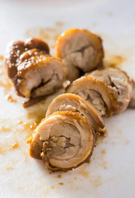 Chicken Chashu is a spin on the popular Pork Belly Chashu ramen topping. Rolled chicken thighs are pan-fried, braised in a sweet soy sauce, then left to marinade to soak in the delicious seasoning. 
