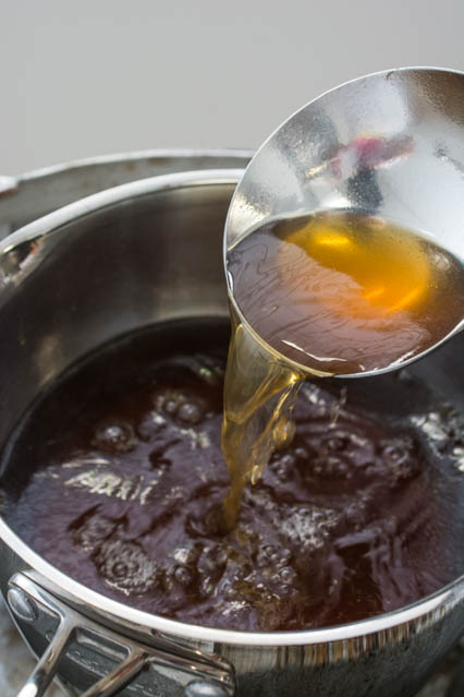 Traditional Shoyu Ramen features a savory soy-sauce based clear broth and ramen noodles with classic toppings such as chashu, seasoned bamboo shoots, and a half-boiled seasoned egg.