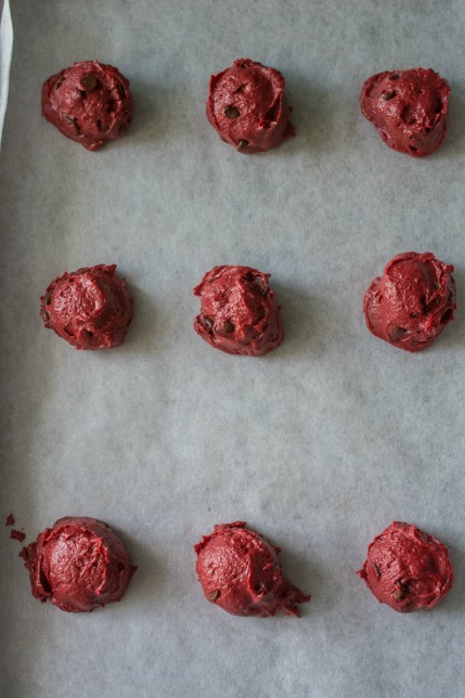 These Red Velvet Chocolate Chip Cookies are awesome enough on their own, but add the Cream Cheese Frosting and it takes the cookie to a whole new level of YUM!