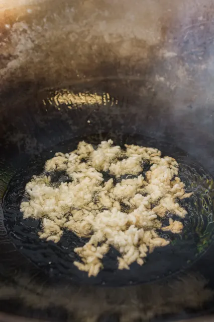 making crispy rice in wok