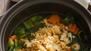 sizzling rice soup in a large bowl
