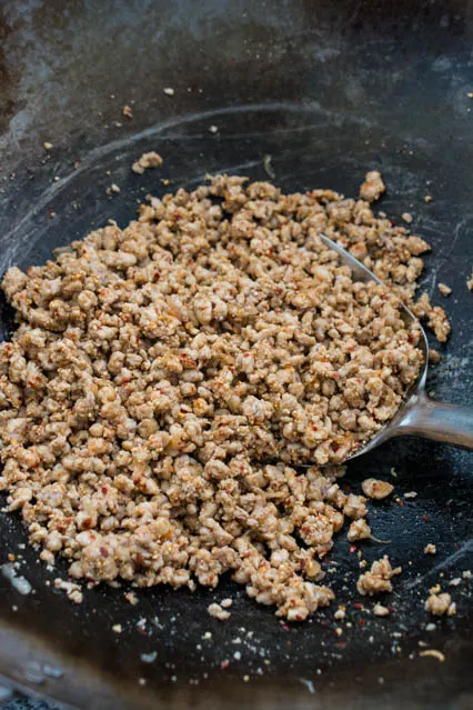 stir-fried Thai Larb in wok