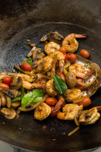 stir fried tom yum shrimp in wok