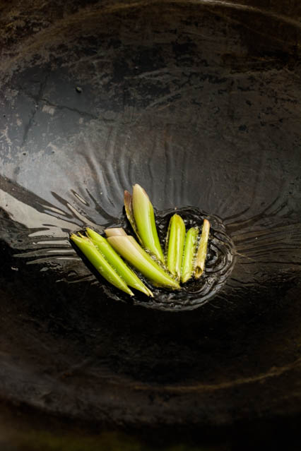 cut lemongrass in wok