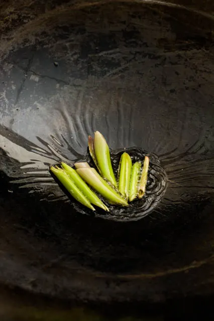 cut lemongrass in wok