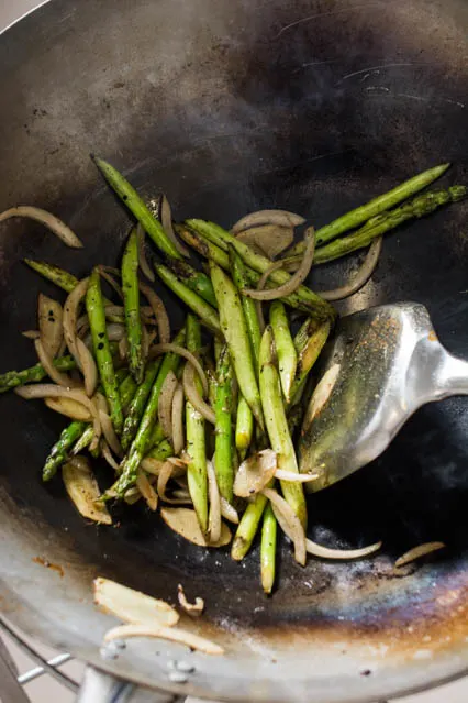 asparagus and onion in a wok