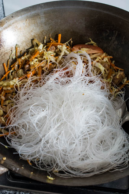 vegetables and glass noodles in a wok for pad woon sen