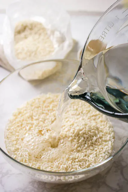 pouring water over glutinous rice