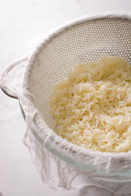 glutinous rice in a colander