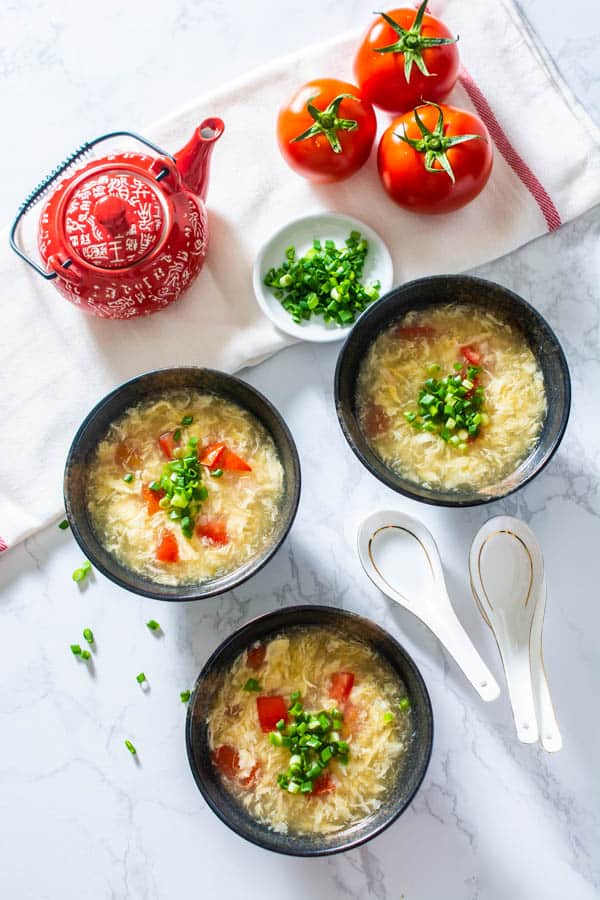 egg drop soup in three bowls