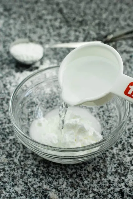 pouring water on cornstarch