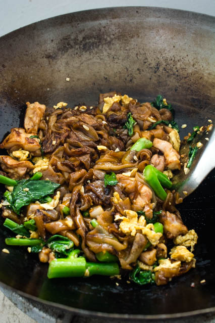 stir frying pad see ew in wok